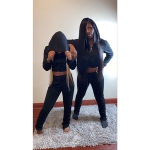 Black stacked jogging suit